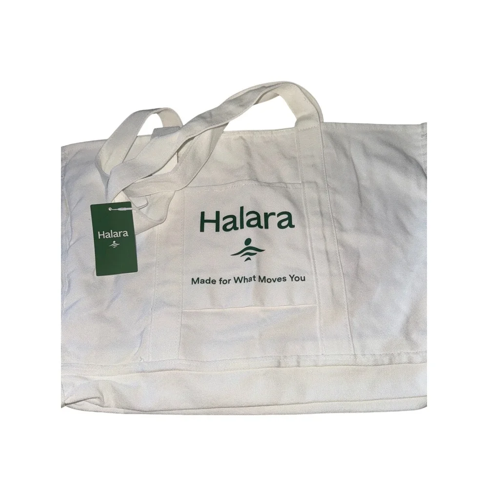 Women's white Halara canvas tote bag with a‎ green logo and text NWT travel gym